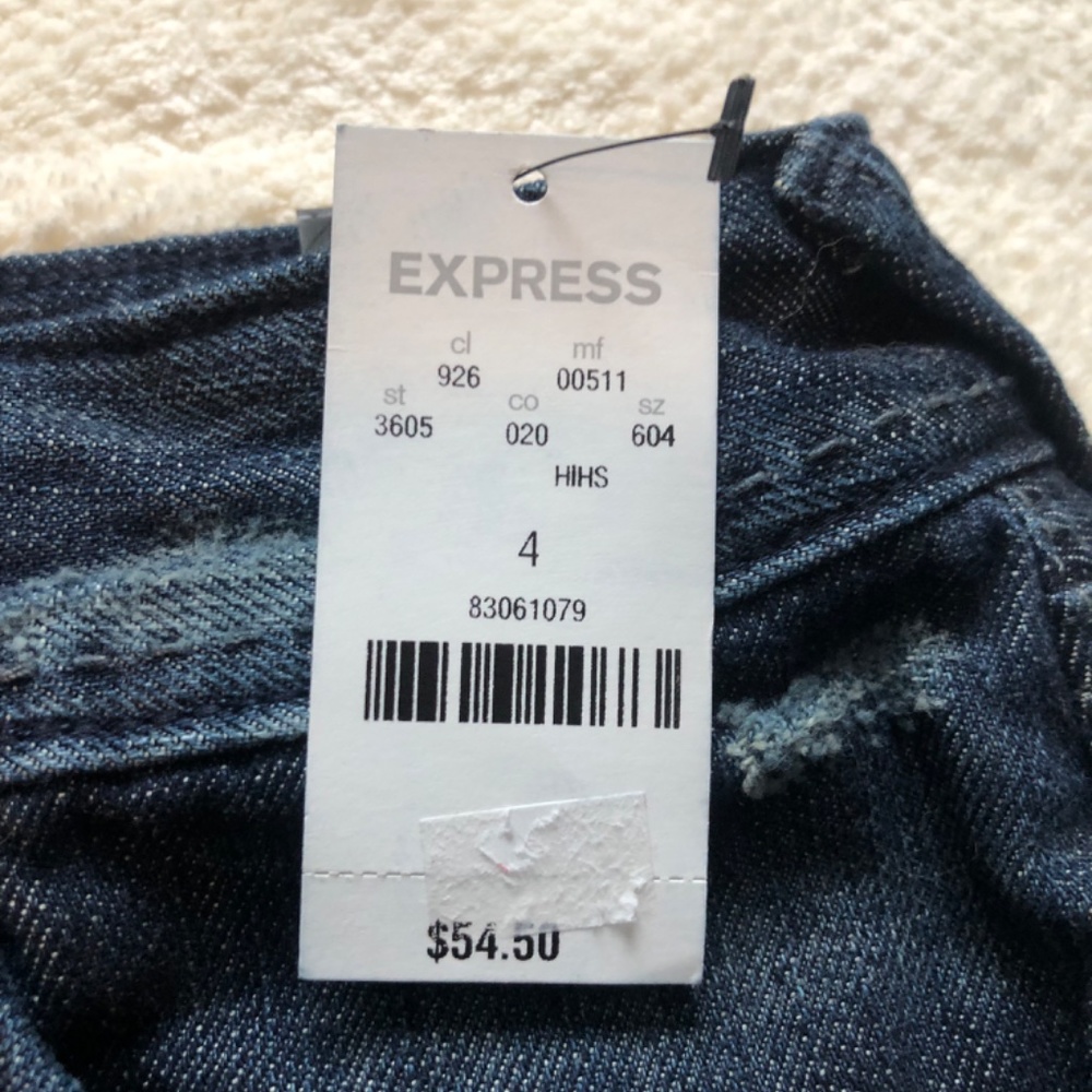 Express distressed blue denim mini skirt with rhinestone-embellished Pockets - Picture 2 of 5